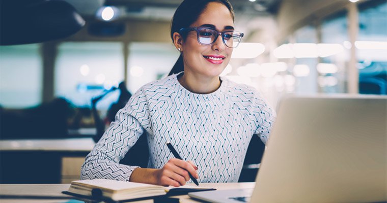 woman using laptop computer in a office